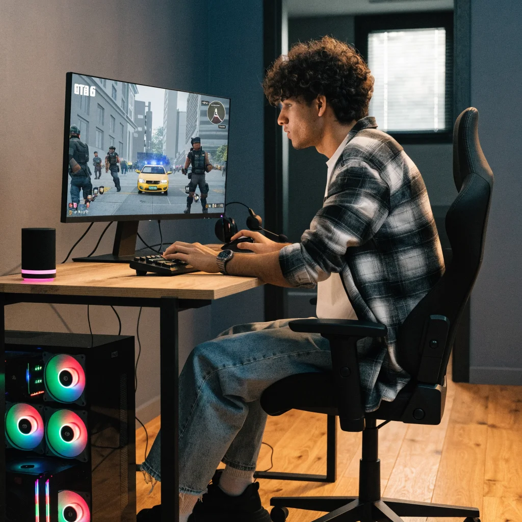 A realistic photo of a gamer playing GTA 6 on a PC with detailed NPC interactions and immersive heist gameplay visible on the screen.
