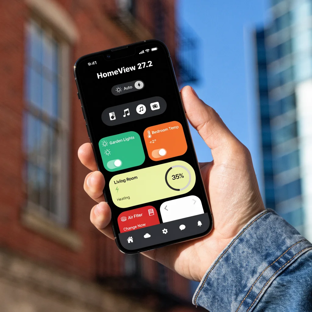 A sleek modern smartphone showing HomeView 27.2 with new Control Center and automatic Light/Dark mode switch on screen.
